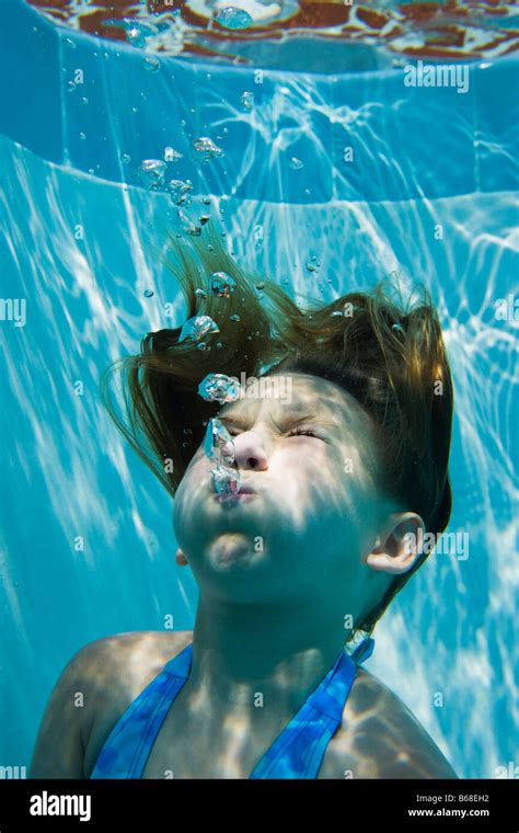 Girl 6 9 With Eyes Closed Underwater Stock Photo Alamy