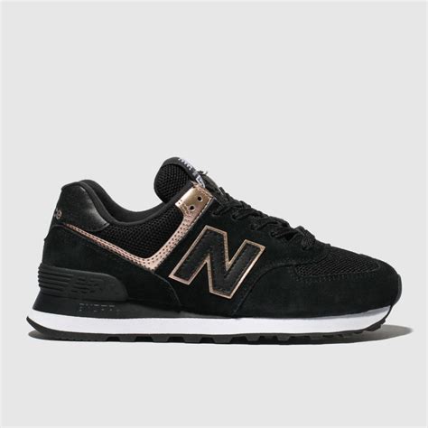 Shop the new balance men's 574 on sale at joe's new balance outlet. womens black & gold new balance 574 suede trainers | schuh