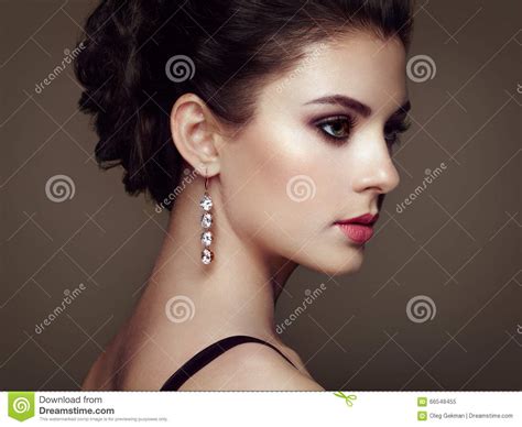 Fashion Portrait Of Young Beautiful Woman With Jewelry Stock Image