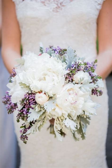A Bouquet Of White Peonies Purple Waxflowers Gray Dusty Miller Blue