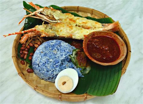 Sarena started out offering her nasi lemak with sotong goreng (fried squid). Penang Lobster Cheese Nasi Lemak at Projek Nasi Lemak ...