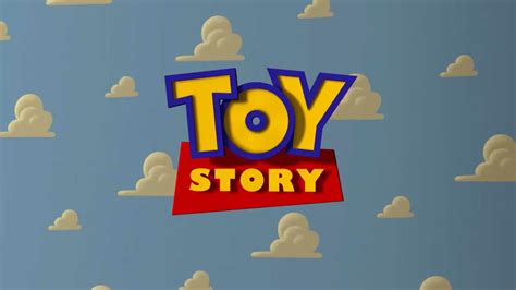 The Toy Story Logo Is Shown Against A Blue Sky With Clouds In The
