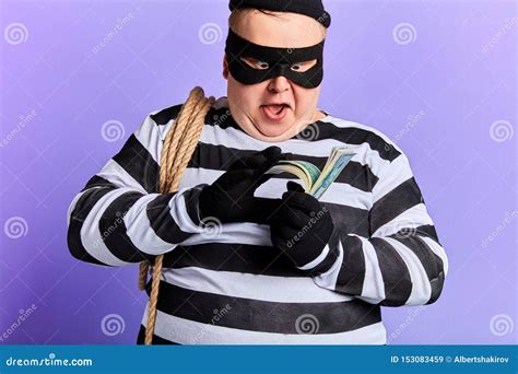 Happy Excited Fat Young Man Holding Money Counting It Stock Image