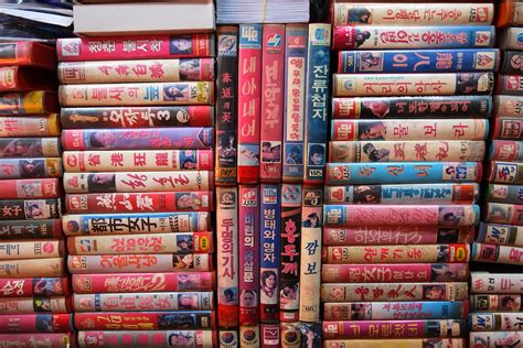 seoul korea vintage vhs video store with stacks of 80s tapes showing some spine a photo on