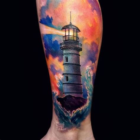 A Mans Leg With A Watercolor Lighthouse Tattoo On His Left Side And An
