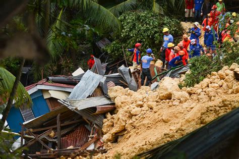 in photos landslides buries homes in naga city cebu abs cbn news