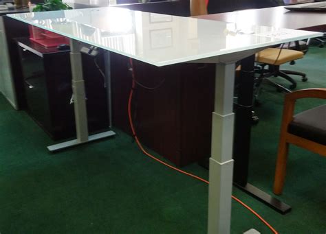 Maybe you would like to learn more about one of these? 6' Adjustable Height Glass Desk - Mad Man Mund