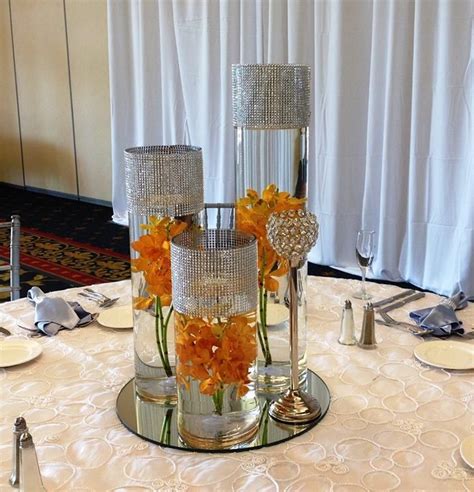 Buy mind reader offer code save candle holders at macys.com. Centerpiece. Cylinder Vases. Submerged. Orange Mokara ...