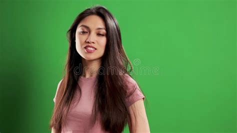Portrait Shot Of A Beautiful Asian Woman In A Studio Extreme Slow