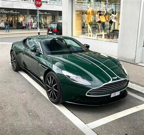 Cả ferrari roma và aston martin db11 đều là mẫu xe có kiểu dáng grand tourer. Aston Martin DB11 British Racing Green | Aston martin sports car, Aston martin db11, Aston ...