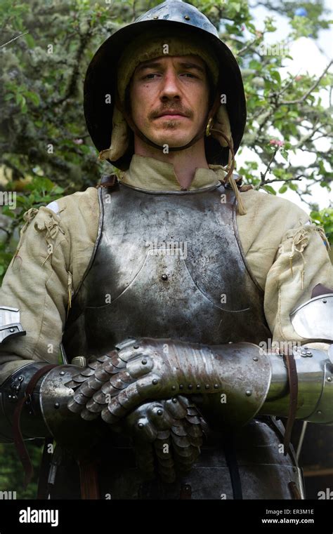 Medieval Soldier Wearing Helmet Brestplate And Gauntlets Stock Photo