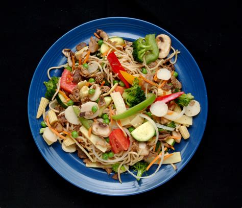 Chilled rice salad with water chestnuts. Pork, Chinese Noodles, Broccoli, Bamboo Shoots, Baby Corn ...