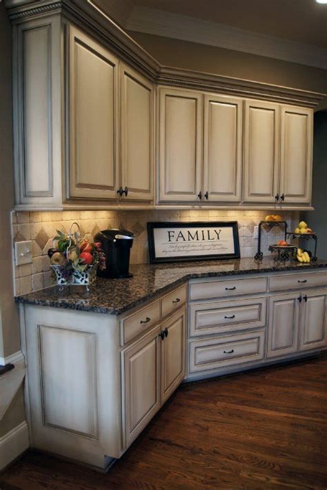 You would never believe it from these photos but, prior to painting cabinets white in here, this kitchen feature dark espresso units. How to paint antique white kitchen cabinets - step by step