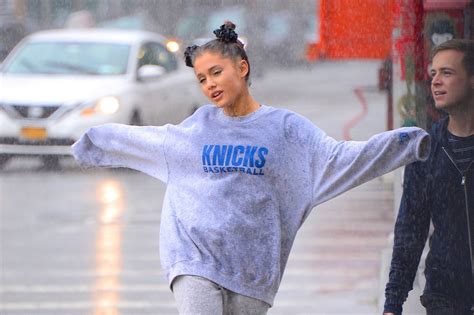 ariana grande dances in the rain after taking time out to ‘heal following mac miller s death