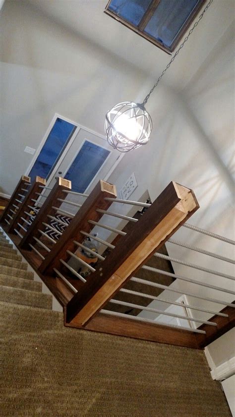 Rebar of 60 grade with a quantity of 5 tons or 5000 kg is used to build the grey structure of a house. Rebar railing | Rebar railing, Refinish stairs, New staircase