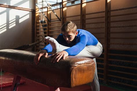 Male Gymnast Performing On Pommel Horse By Stocksy Contributor Jovo