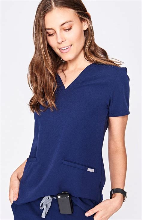 With Stretch Fabric And Three Pockets The Women S Casma Scrub Top Is Ready For Busy Days Part