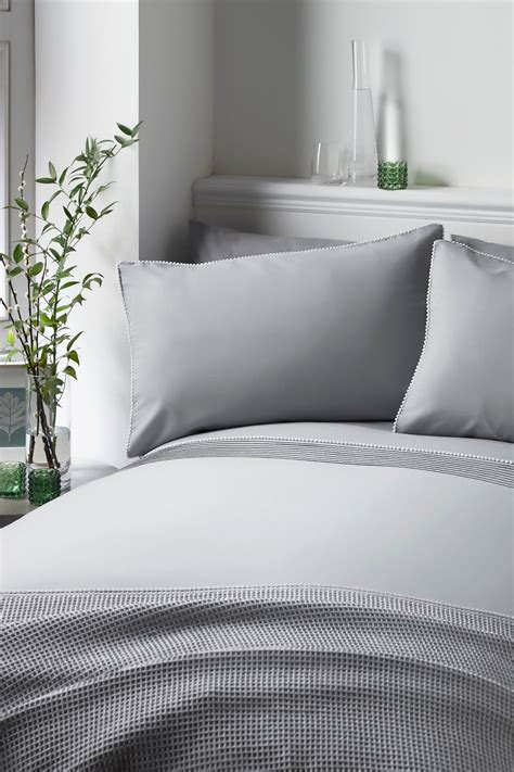 In fact, in the uk, luxury bed linen that is both organic. Serene Pom Pom Duvet Cover and Pillowcase Set | Bedding ...