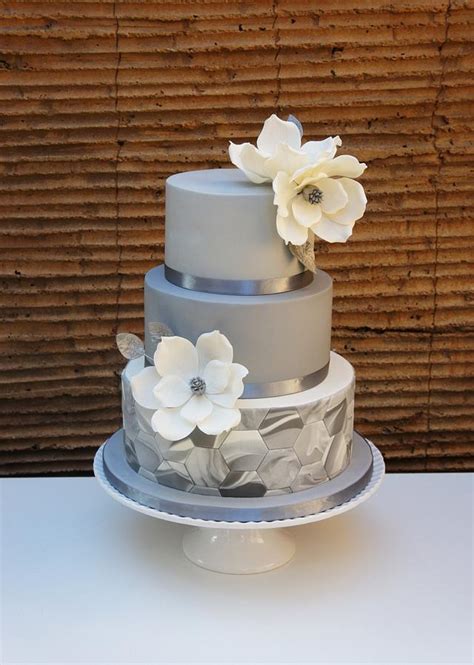 Wedding Cake With Marble Fondant And Magnolias Cakesdecor