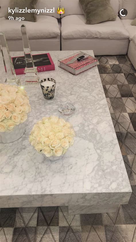 Kendall jenner, wearing a prada jacket, top, and pants, and nevernot earrings, in the sitting room of her bedroom suite. Kylie's living room | Kylie jenner house, Living room ...