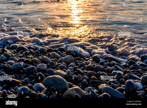 Round Stones On Beach Sunrise Hi Res Stock Photography And Images Alamy