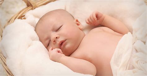 Baby Sleeping On White Cotton · Free Stock Photo