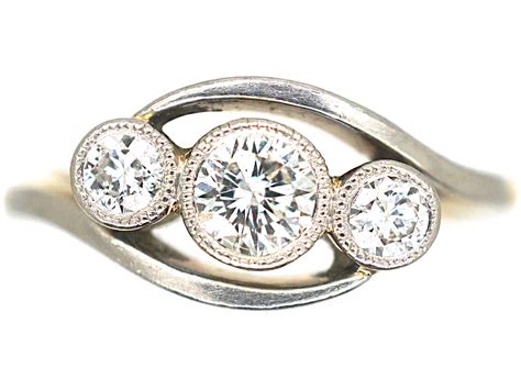 Edwardian 18ct Gold And Platinum Three Stone Diamond Crossover Ring 959p