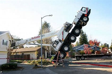 Curious Funny Photos Pictures 50 Ton Crane Falls Into House Santa