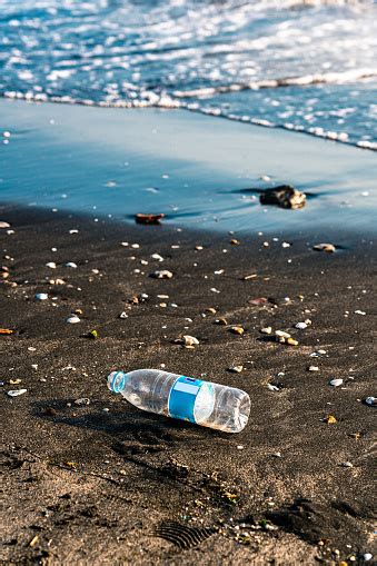 Plastic Water Bottle Pollution In Ocean Stock Photo Download Image