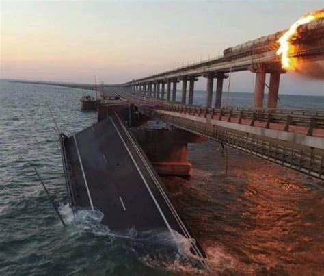 Crimean Bridge Hit By Explosion Erupts In Flames As Heavy Damage Seen