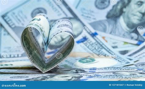 One Hundred Dollars Us Banknote In The Shape Of A Heart Money