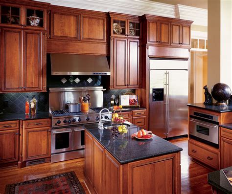 Get inspired by our favorite dark, medium, and light wood kitchen cabinets, including ideas for oak, walnut, fir, and cherry wood cabinets. Kitchen with Cherry Cabinets - Decora Cabinetry