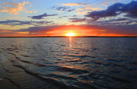 Sunset Over Water Surface Stock Photo Image Of Outdoor 18238076