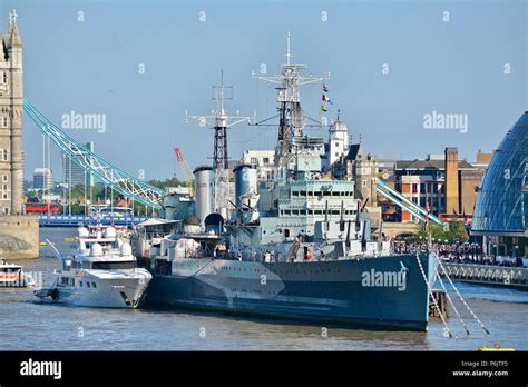 Hms Belfast Docked In The River Thames At The Imperial War Museum
