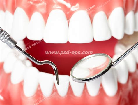 عکس با کیفیت تصویری از فک و دندان به همراه ابزار معاینه لایه باز طرح آماده Psd Eps