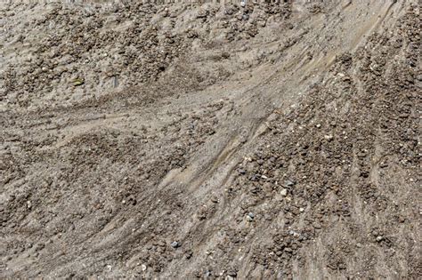 Dirty Washed Dirt Road With Traces Of Water Flow In Spring Off Road