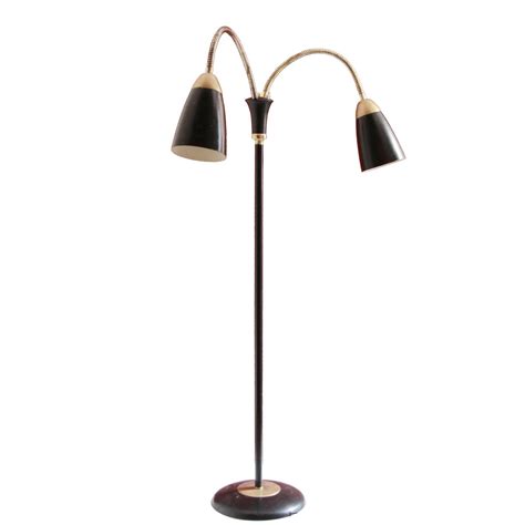 The flexible gooseneck design lets you adjust the lamp to any angle to direct light where you need it. Mid-Century Floor Lamp with Two Flexible Arms, 1950s for sale at Pamono