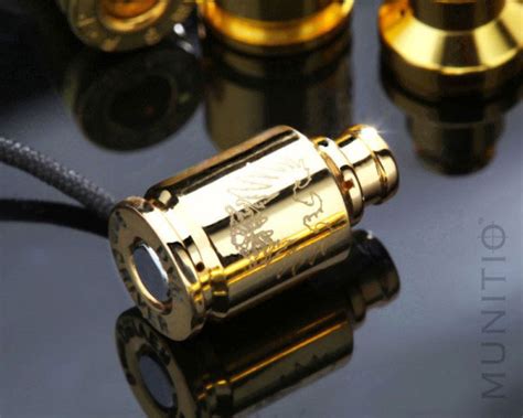Munitio Teknines Gold Plated Bullet Shaped Nine Millimeter Earphones