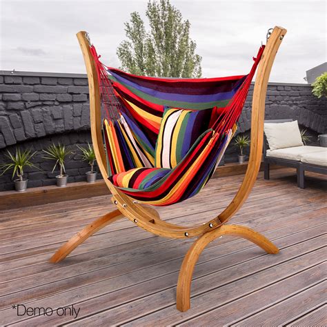 Multi Colour Hammock Chair With Pillows And Curved Wooden Stand