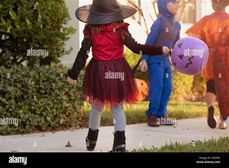 Children Going Trick Or Treating Stock Photo Alamy