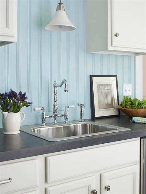 Here's another kitchen cabinet style that works everywhere. beadboard backsplash painted blue with white cabinets ...