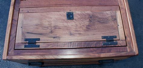 Just lifting it effortlessly, there is extra storage room provided. Artisans of the Valley - Hand Crafted Custom Tables Page 3