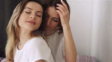 two happy lesbian luxuriate in bed at home stock footage video of cute girlfriend 171216518