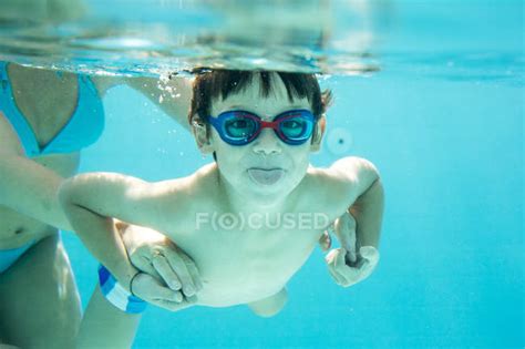 Little Boy Diving With Mother Underwater In Swimming Pool — Together