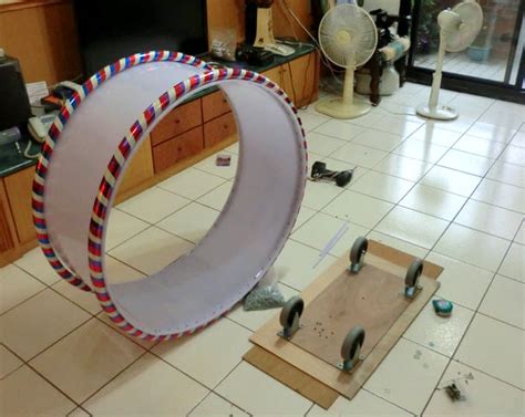 It assembles like a puzzle with each part cnc milled with precision. DIY Plastic Cat Wheel - petdiys.com