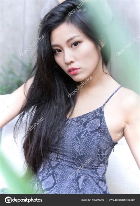 Beautiful Young Asian Woman Stock Photo By ©avfc 180003398