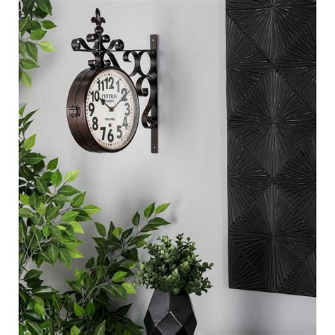 The double sided hanging clock requires two aa batteries for operation. Stratton Home Decor White Rustic Farmhouse Wall Clock ...
