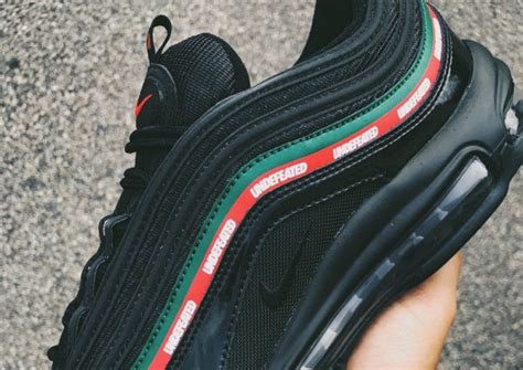 The sneaker has a black upper with the wavy side panel stripes rendered in speed red and gorge green for a luxury aesthetic. Undefeated x Nike Air Max 97 Release Date - Sneaker Bar ...
