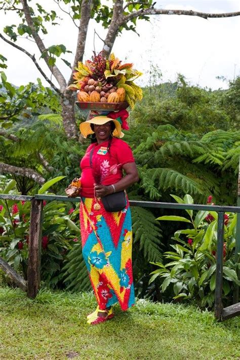 a grenadian woman shows off the island s abundance of spices from how