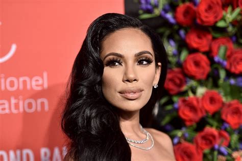 erica mena flaunts her curves in this skintight outfit see her rocking a new look here